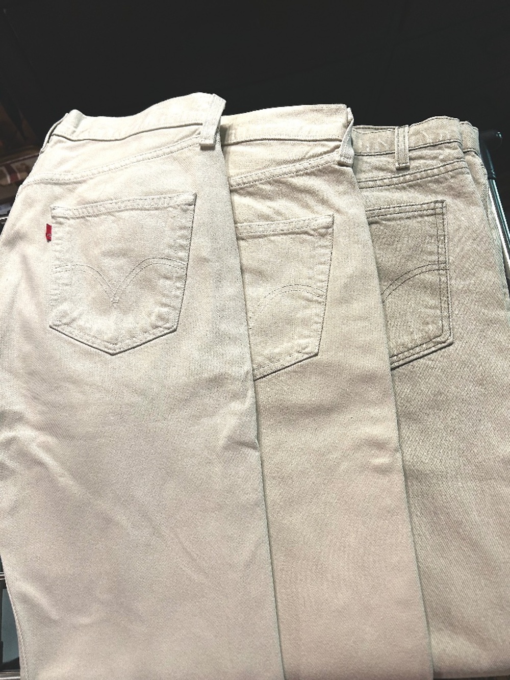 Men's 3 Levi 501s and 34/29  - two wheat and one sand.